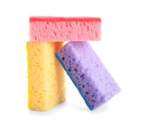 Colorful cleaning sponges on white background