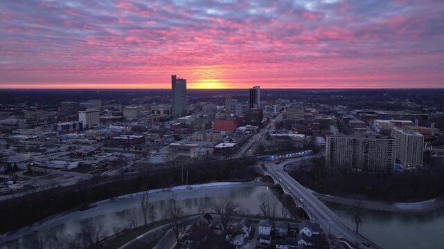 Pink sunset in winter downtown Fort Wayne Indiana along the St. Joseph River