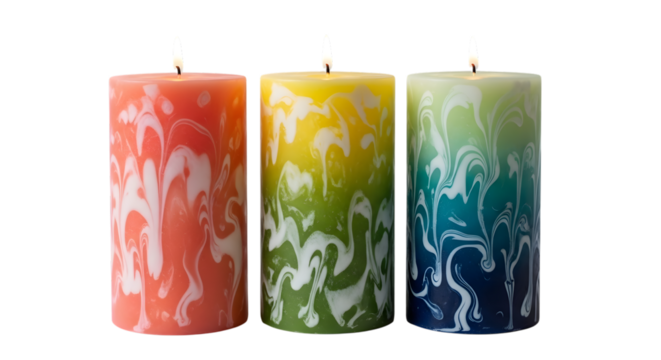Three tall cylindrical candles with vibrant marbled patterns in red yellow and green against a black background