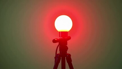 Modern 360 camera rotating smoothly against vibrant green chroma key background, perfect for VR content creation and immersive video experiences