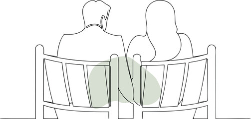 Couple sitting on park bench outdoors