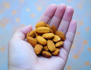 Handful of almonds held in a palm