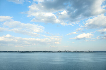 Beautiful view of blue sky with clouds over sea as background