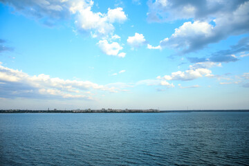 Beautiful view of blue sky with clouds over sea as background