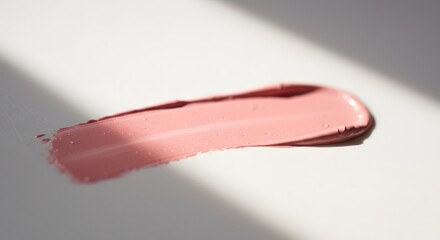 Fototapeta premium Creamy Pink Lip Product Swatch with Natural Shadow