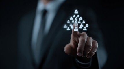 A hand holding a digital sphere with human figure models inside. resource, management, proper, solution, business, human, challenge