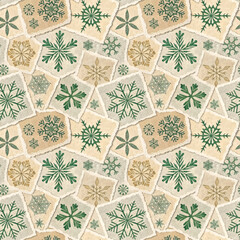 Seamless pattern featuring green and gold snowflakes printed on torn textured paper pieces in warm beige tones.