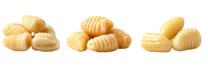 Three piles of shell-shaped, ridged, pale dumplings