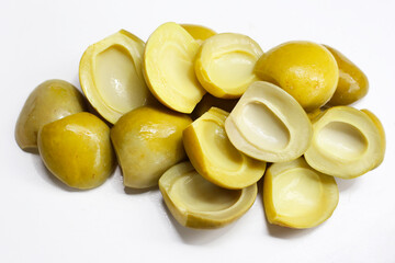 Salty pickled Ma-Muang Bao (Thai small mango) halves without seed.