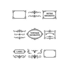 Collection of ornate vintage decorative frames and labels