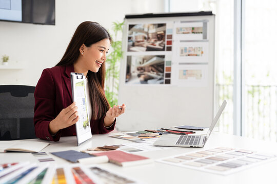 Architect offer apartment layout to client before renovation. Interior designer advises client to choosing materials and color tones, focusing on design elements, creative concepts.