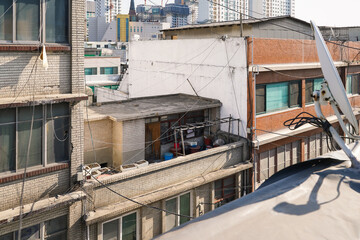 Typical residential house exterior in urban South Korea, showing everyday urban living environment.