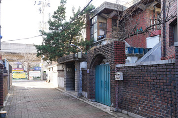 Typical residential house exterior in urban South Korea, showing everyday urban living environment.