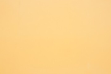 Soft peach and orange gradient background with subtle pixelation