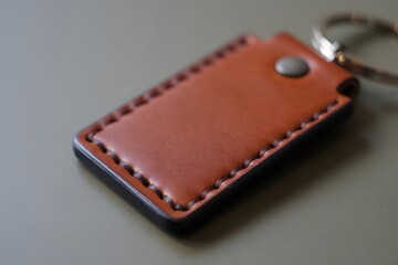 Handcrafted leather keychain with metal ring and rivet