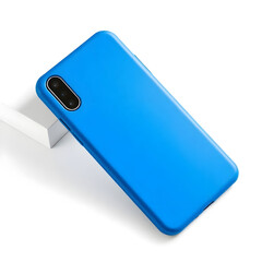 A sleek blue phone cover with a matte finish and subtle texture is placed prominently on a pristine white background