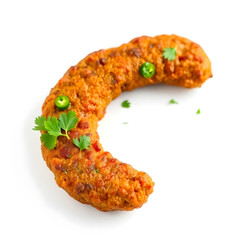 A beautifully presented chakli kebab on a pristine white background