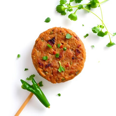 A beautifully presented chakli kebab on a pristine white background