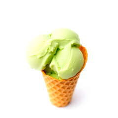 A green pistachio ice-cream in cone on white background