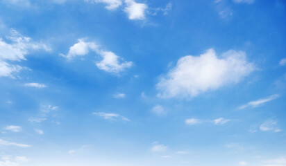 sky is blue and clear with  few clouds scattered throughout