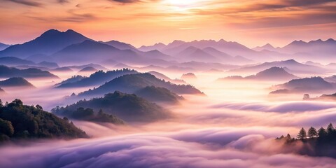 Obraz premium Serene Sunrise Over Misty Mountain Ranges, a Breathtaking Panorama of Nature's Majesty