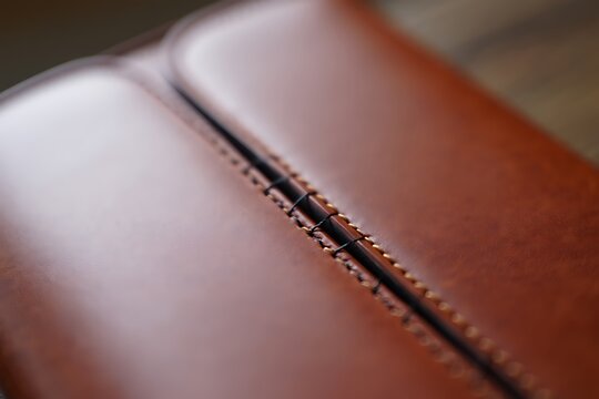 Close up of a detailed leather seam with visible stitching