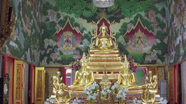 Gilded Buddha statues in Wat Don Mueang Phra Aram Luang