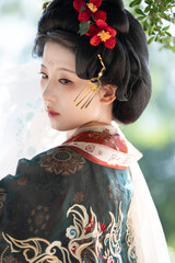 Young woman wearing ancient Chinese Hanfu	