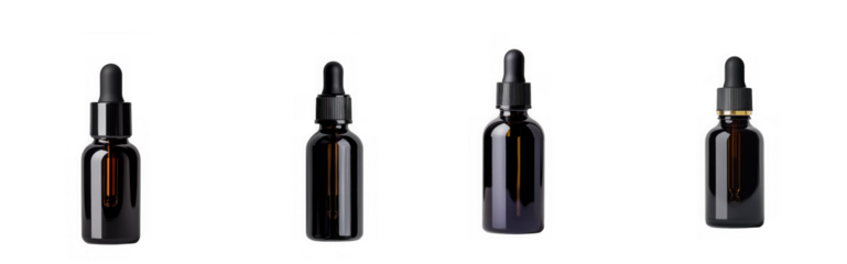 Four amber glass dropper bottles with black caps, isolated on transparent background