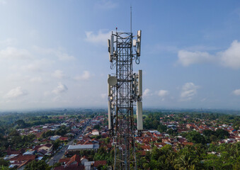 Aerial Photo of Telecommunication Tower in Rural Area Surrounded by Trees and Rice Fields