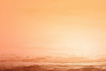 Obraz premium A textured, gradient orange and peach background evoking warmth and an abstract, hazy ambiance
