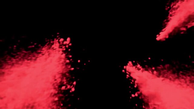 Vibrant red powder exploding against a dark background, creating a dramatic and energetic visual.