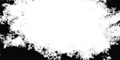 Grunge black and white distressed texture with scattered speckles and blotches for abstract background or overlay design.