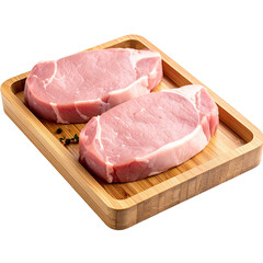 Transparent PNG Fresh pork chops on a wooden cutting board, ready for preparation and cooking. Ideal for gourmet recipes.