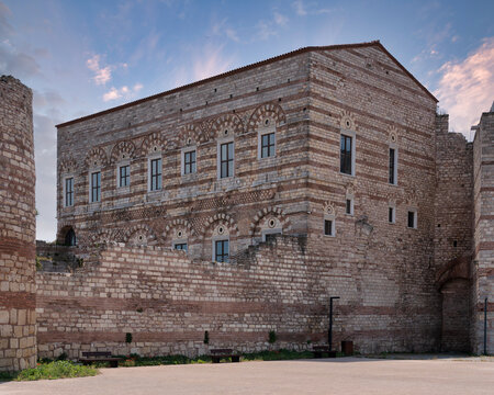 Palace of the Porphyrogenitus, Turkish: Tekfur Sarayi, a historic Byzantine palace in Istanbul, Turkey. Features distinctive stone and brick architecture under a blue sky