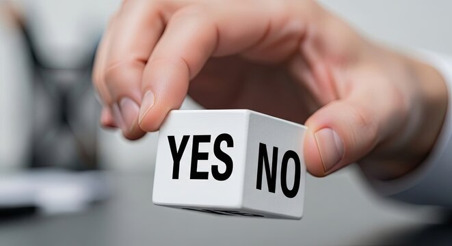 Decision making concept holding a cube with yes and no choices