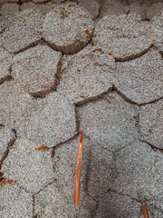 A vast quantity of unlit incense sticks bundled together, creating a unique textured background....