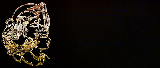 golden, textured outline of Lord Shiva and Goddess Parvati (Shiva-Parvati) on a solid black background