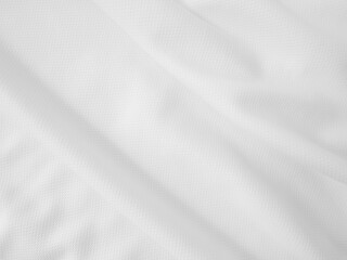 Close-up wavy cloth. White crumpled fabric background