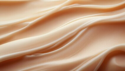 Fototapeta premium Smooth flowing silky fabric with soft folds and warm beige color creating a gentle and luxurious texture