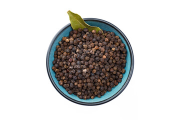 Black peppercorns on white background	