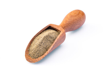 Ground black pepper powder on white background	
