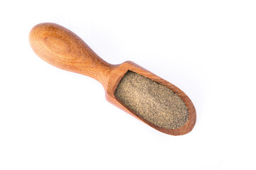 Ground black pepper powder on white background	
