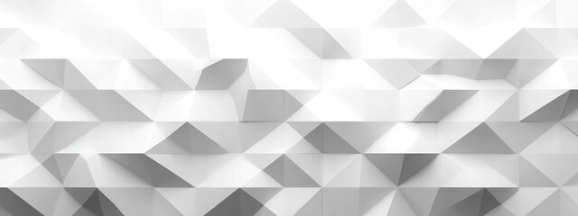 Abstract white geometric wall pattern with three-dimensional triangular shapes creating a modern architectural texture and light shadows