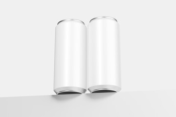 Two Beverage Cans Showcasing a Design Template in a Studio Setting