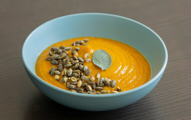 creamy butternut squash pumpkin soup with sage and pumpkin seeds cozy fall dinner