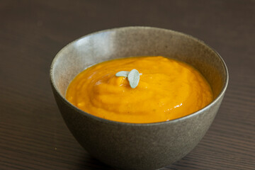 creamy butternut squash pumpkin soup with sage and pumpkin seeds cozy fall dinner