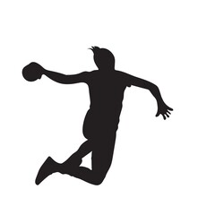 silhouette of a young man jumping throwing the ball
