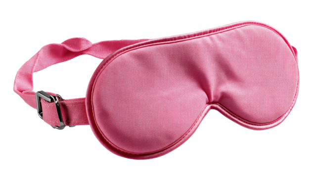 Serene Slumber: A soft, pastel-pink sleep mask, promising blissful rest and tranquility, invites a moment of peace and deep relaxation.