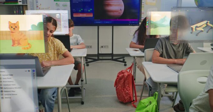 Schoolchildren Using Augmented Reality For Creative Digital Learning. Boys and Girl in Futuristic Classroom Explore AR and Digital Design Tools. Screens Show 3D Models, Animation, Code. Dolly Shot.